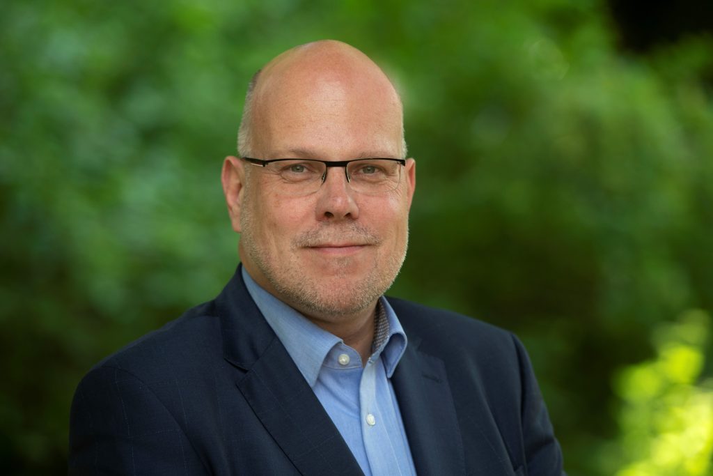 Foto van Leon Busschops, de gemeentesecretaris van Sittard-Geleen.